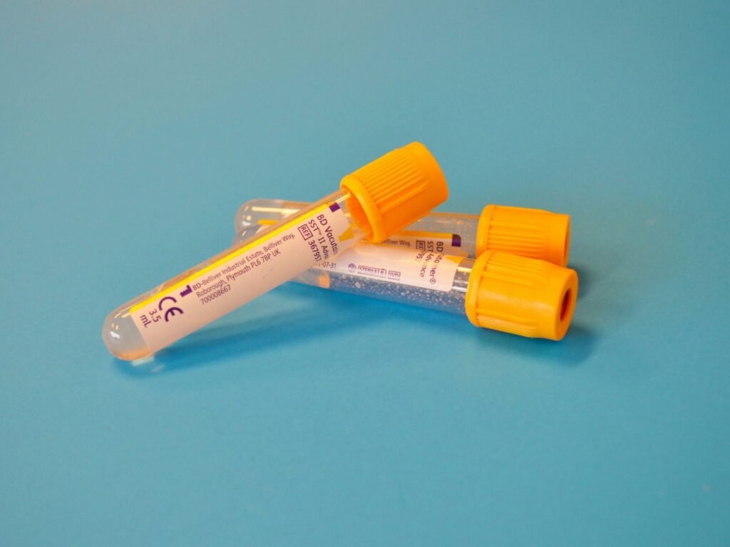 Molded sample collection tube cap component